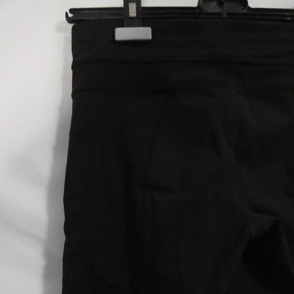 LULULEMON ATHLETICA | size 4 | Black Yoga Leggings | Mesh Panels | Zip Pockets - Picture 10 of 16